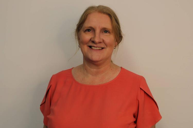 Headshot of Suzzane Burgess-Dean