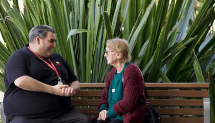 St Johns worker chatting to elderly lady