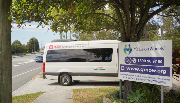 An image of the St Johns QLD community transport van pulling into the BNE Meals on Wheels facility.
